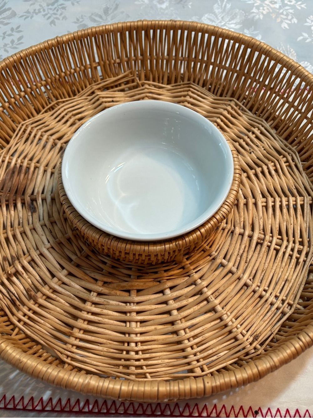 White Ceramic Serving Bowl with Woven Rattan Base